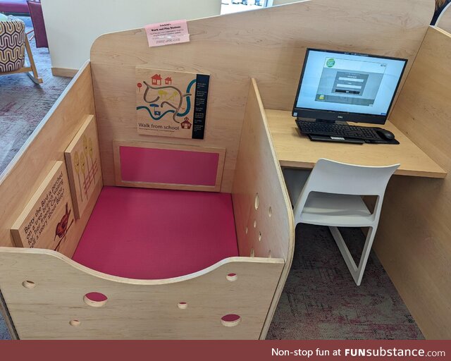 Our local library has computer workstations with a space for infants to nap or play while