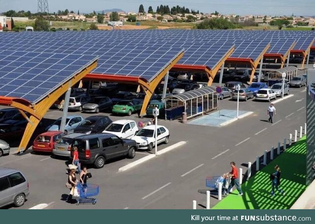 Solar panels in parking lots make so much sense. We should do this everywhere in the US