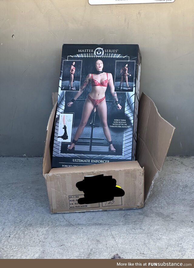 Empty boxes left near a dumpster
