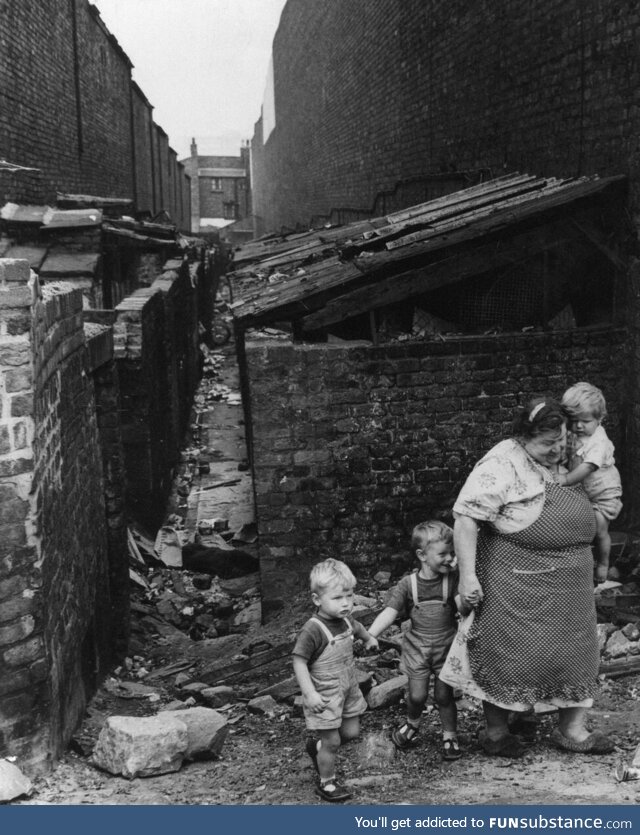 A typical street scene from the slums of the city of Liverpool, UK. 1962