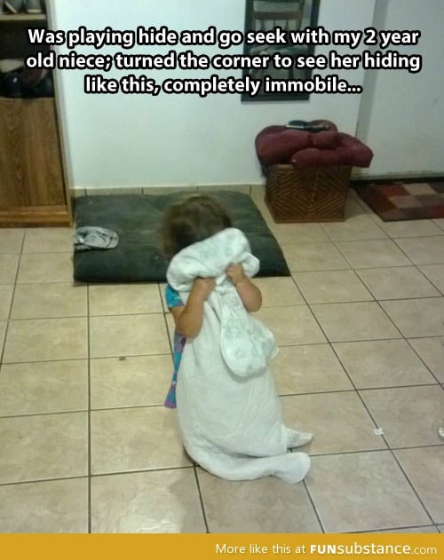 Playing hide and seek with a little girl