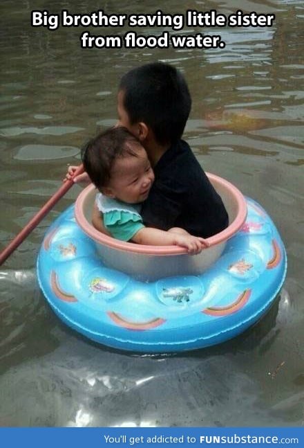 Brother saving his little sister