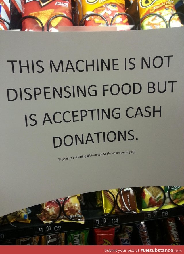 Out of order sign on the vending machine at work