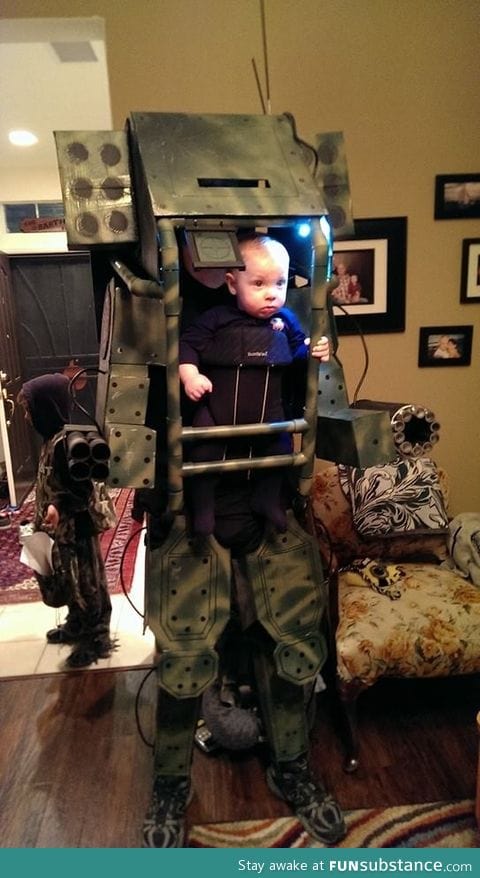 My 6 mo old son in his mech warrior costume for halloween