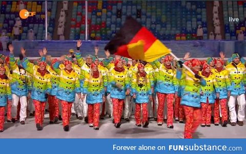 German athletes wearing rainbow-colored jackets