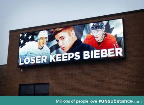 Canada VS USA hockey game tomorrow. This is a billboard in Chicago.