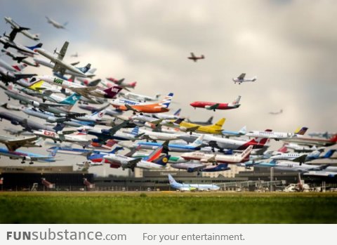 Multiple airplane takeoff photos combined to create this picture
