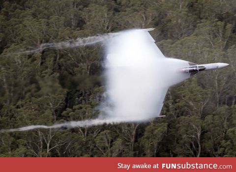 Super hornet visibly breaks the sound barrier