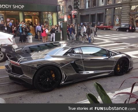 This Lamborghini Aventador looks like a black Tron