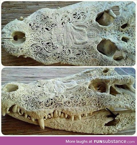 Carved alligator skull