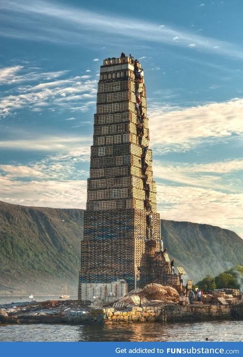 Stacking palettes for the worlds biggest bonfire in norway