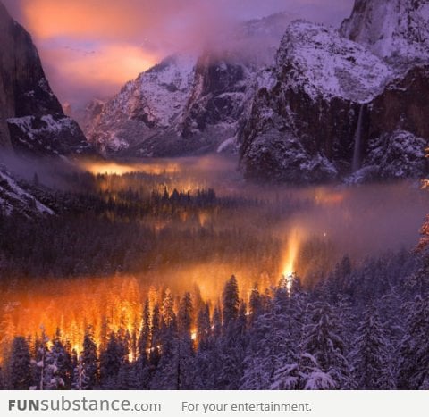 Yosemite Valley illuminated by car headlights at night