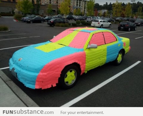 Car covered in post it