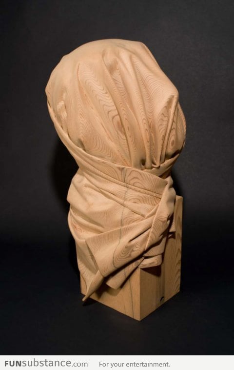 Looks like cloth? Nope, it's a wood sculpture