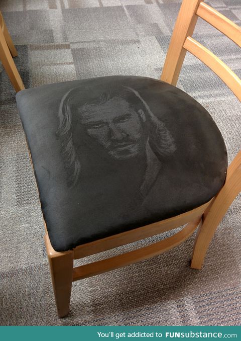 Someone drew Thor on a suede chair