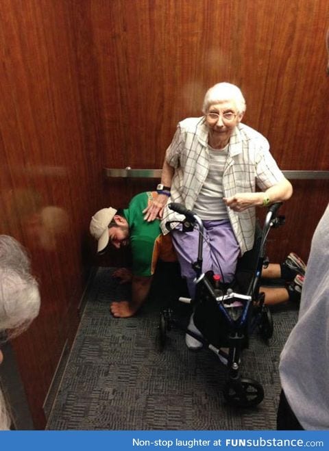 Man Serves As Bench For Elderly Woman Stranded In Elevator