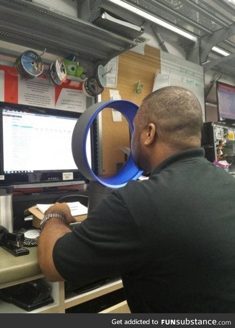 This is how you use a Dyson fan in a hot office