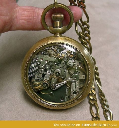 Artist manipulates tiny Watch parts into sculpture. - - Amazing'