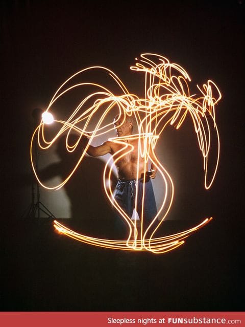 Pablo Picasso experimenting with "light drawing", 1949