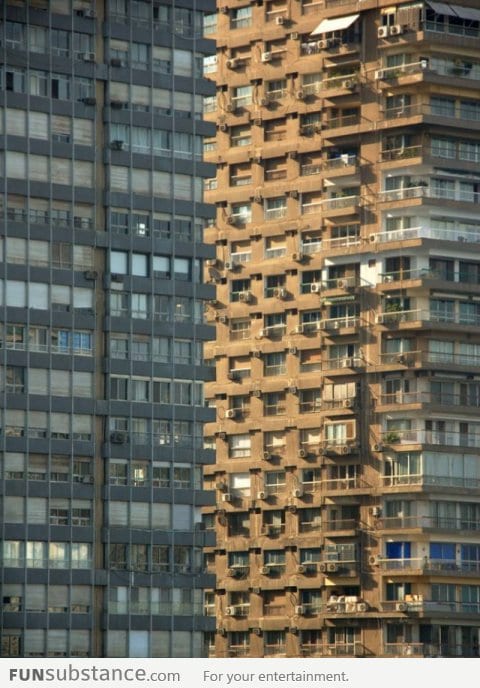 The building on the left is actually behind the right one