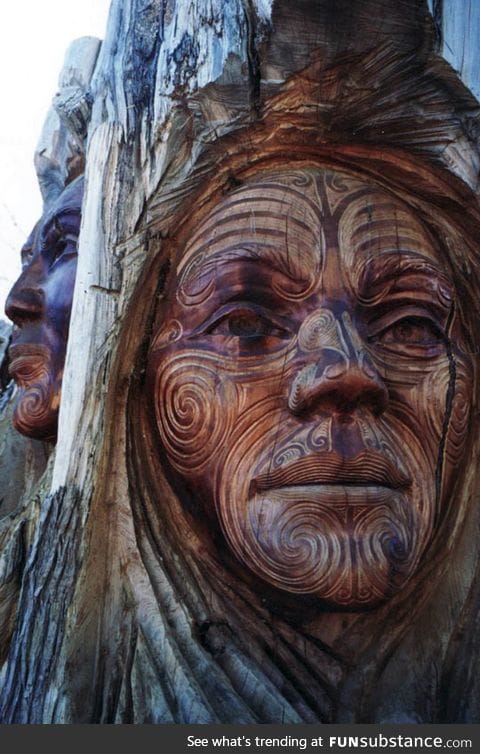 Carved into a tree trunk