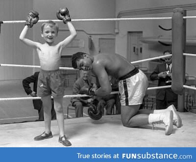 Muhammad Ali letting a young fan win a fight, 1963