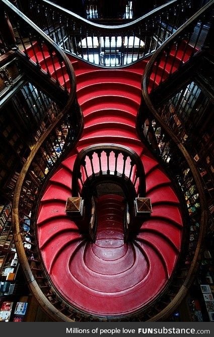 A staircase inside of a bookstore in Portugal