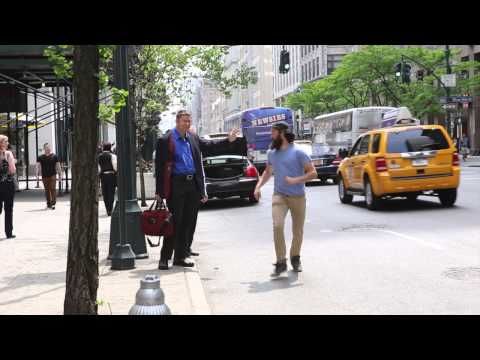 Guy spreads love by high-fiving new yorkers waiting for yellow cabs