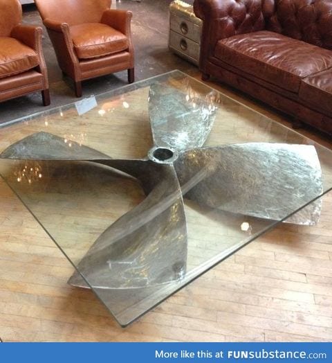 Propeller glass table