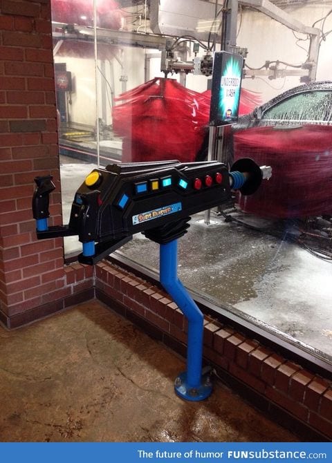 This car wash has a gun where you can shoot cars as they come by