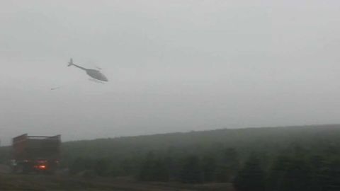 How Helicopters Harvest Your Christmas Trees At Crazy Speeds