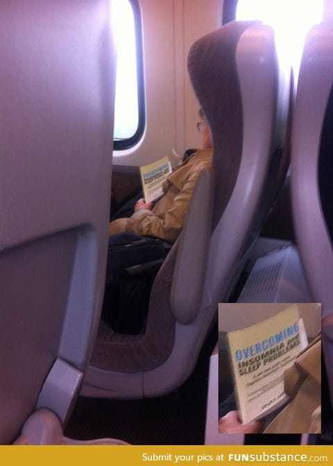 Woman asleep on train