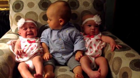 Baby boy is so confused by twin babies
