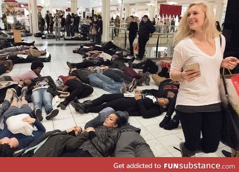 People are hating and judging this woman for shopping during a protest. Oh I salute her