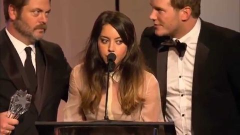 Aubrey Plaza accepting an award on behalf of Amy Poehler