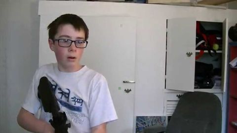 Kid accidentally shoots computer monitor with an airsoft gun while trying to make a video