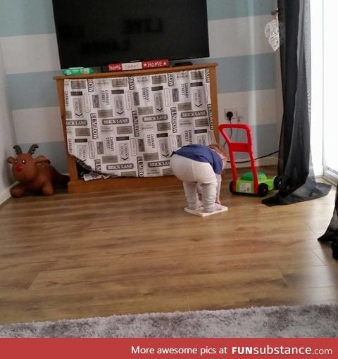 My friends son struggling to pick up a book