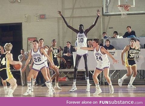 Manute Bol, one of the tallest players in NBA history