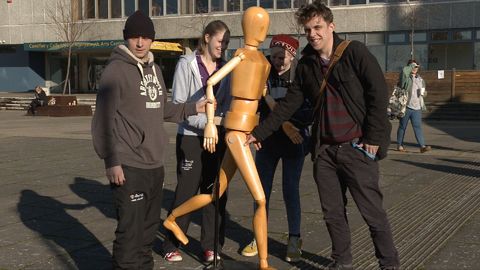 strangers animate a 6ft wooden mannequin from dawn to dusk