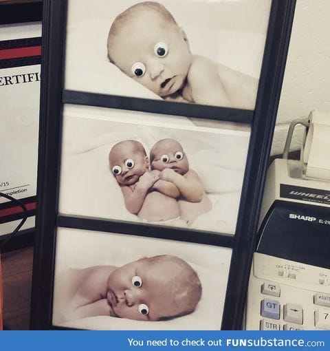 I took my googly eyes to work and decorated my coworker's photos on his desk