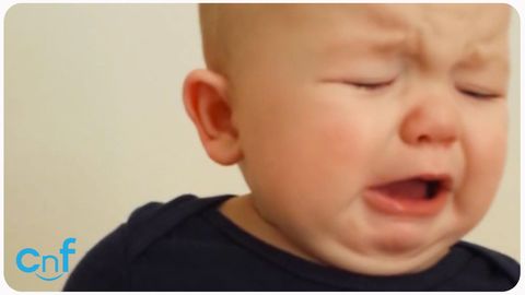 Baby hates dad's bad singing