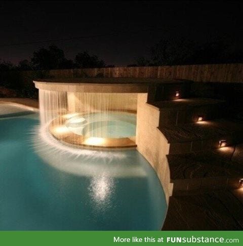 Hot tub under a waterfall