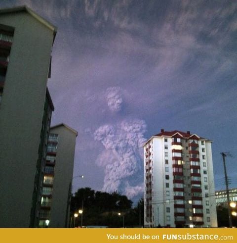 Human-shaped cloud emerging from ash of chilean volcano