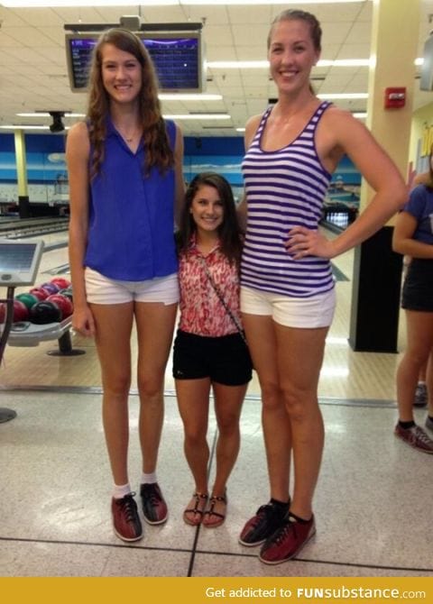 UCF's two tallest volleyball players and shortest cheerleader