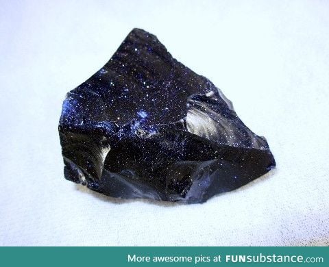 A rock that looks like a piece of space