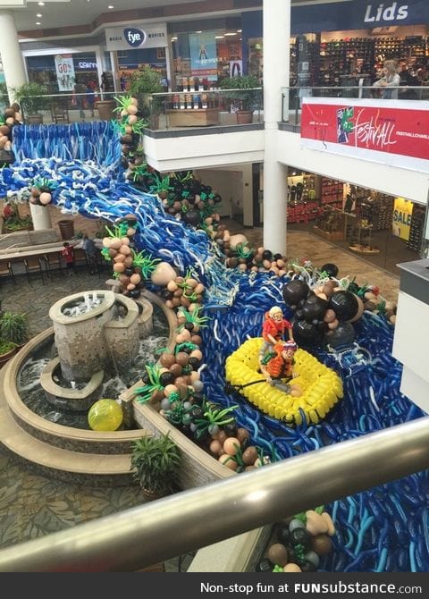 Waterfall and rafting scene made entirely from balloons