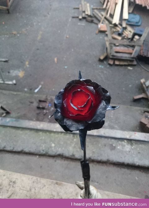 A freshly made metal rose ornament