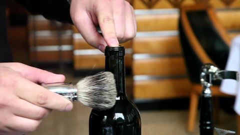 A very sophisticated way to open a bottle of wine