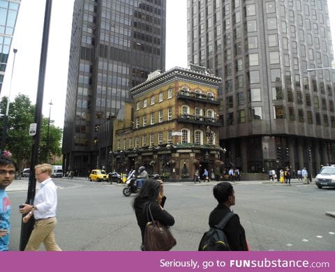 An old pub in the middle of modern day London