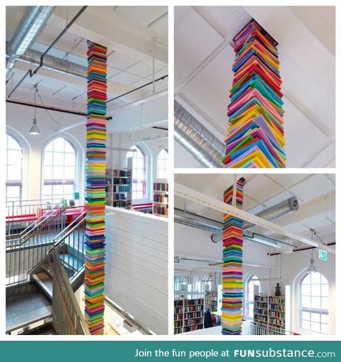In a library in Sweden, an endless stack of 'books' hides the massive structural column